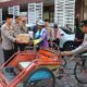 Polres Probolinggo Kota Bagikan 70 Paket Sembako untuk Warga Sambut Hari Bhayangkara ke-80