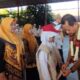 Bupati Kudus melepas peserta program pertukaran pelajar dan guru jenjang SD-SMP di halaman SMP Negeri 2 Jati Kudus, Senin (20/7/2026).
